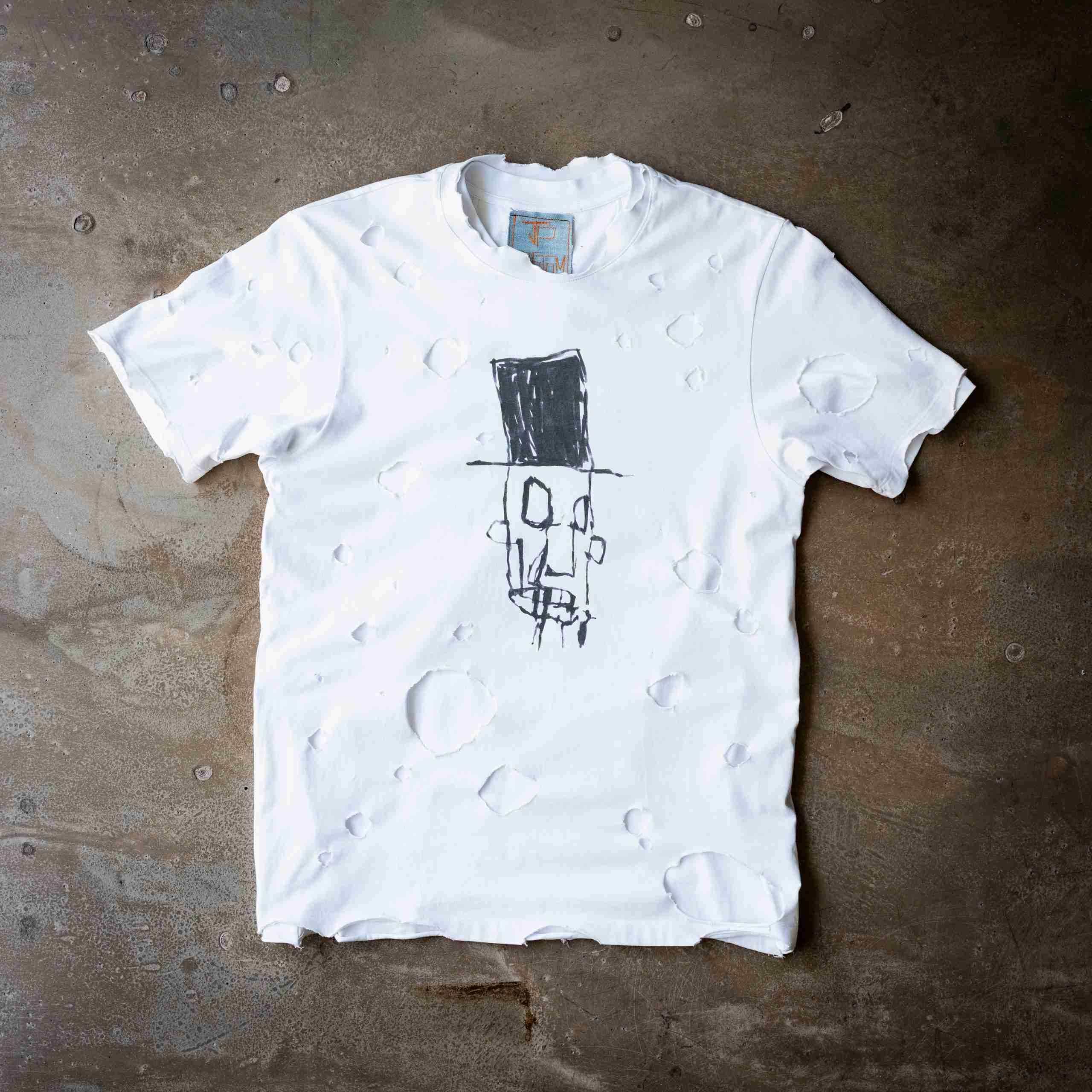 L'UOMO CON IL CAPPELLO